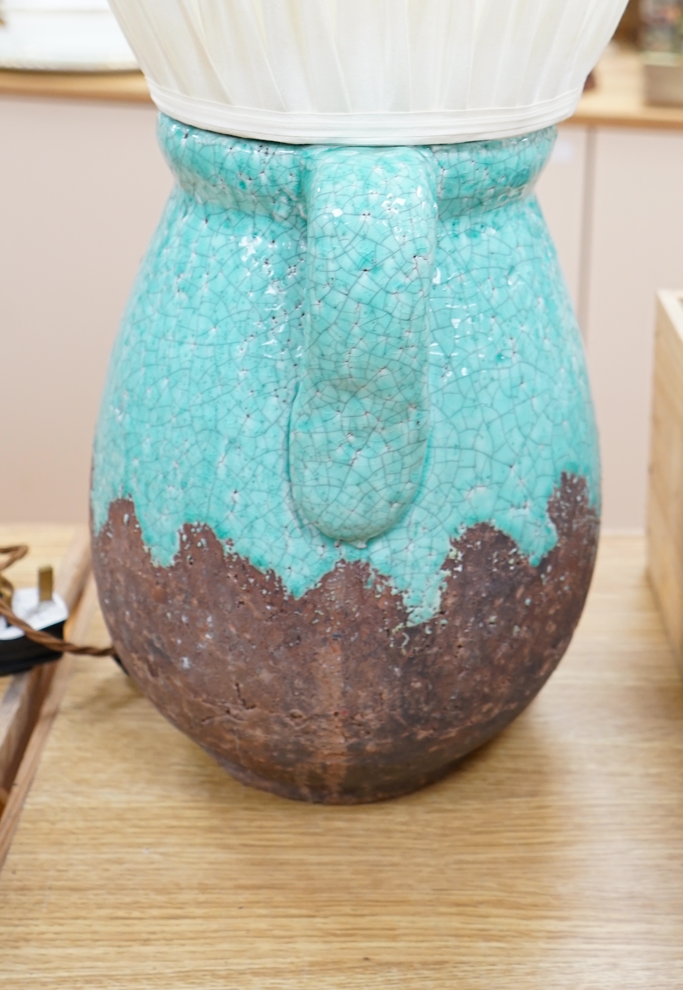 A turquoise lava ceramic table lamp with fabric shade, wired, 65cm high to top of shade. Condition - good